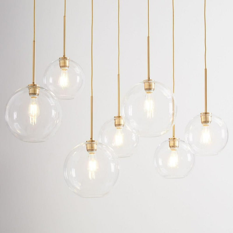 Olvoria | Glass Ball Pendant Light | Modern Brass Design