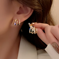 Olvoria | Boucles d'oreilles torsadées | Design élégant | Or ou argent