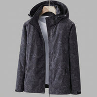 Olvoria | Chaqueta impermeable con capucha y estampado de hojas para mujer
