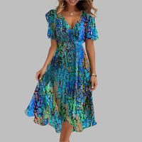 Olvoria | Robe portefeuille midi à fleurs et col en V pour femme