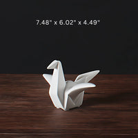 Statue d'oiseau en céramique inspirée de l'origami