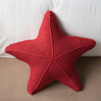 Cojín tejido a mano con forma de estrella de mar
