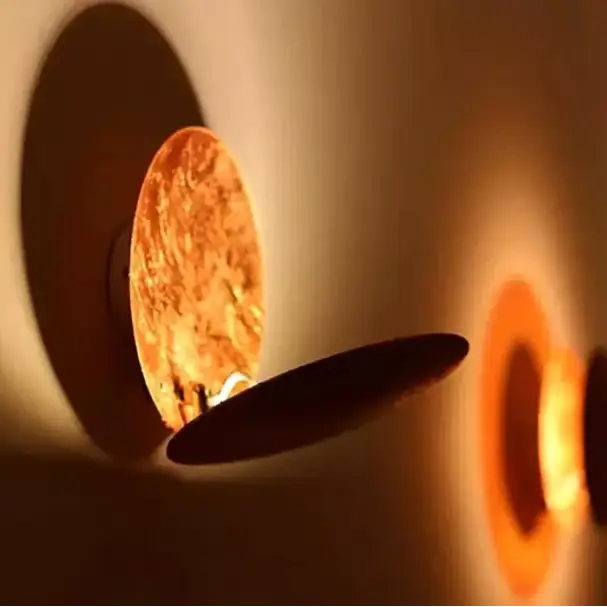 Wall Sconce - Modern Scandinavian Art in the Shape of an Eclipse.